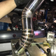 Illustration for article titled Another One - Custom Pie Cut N55 Downpipe
